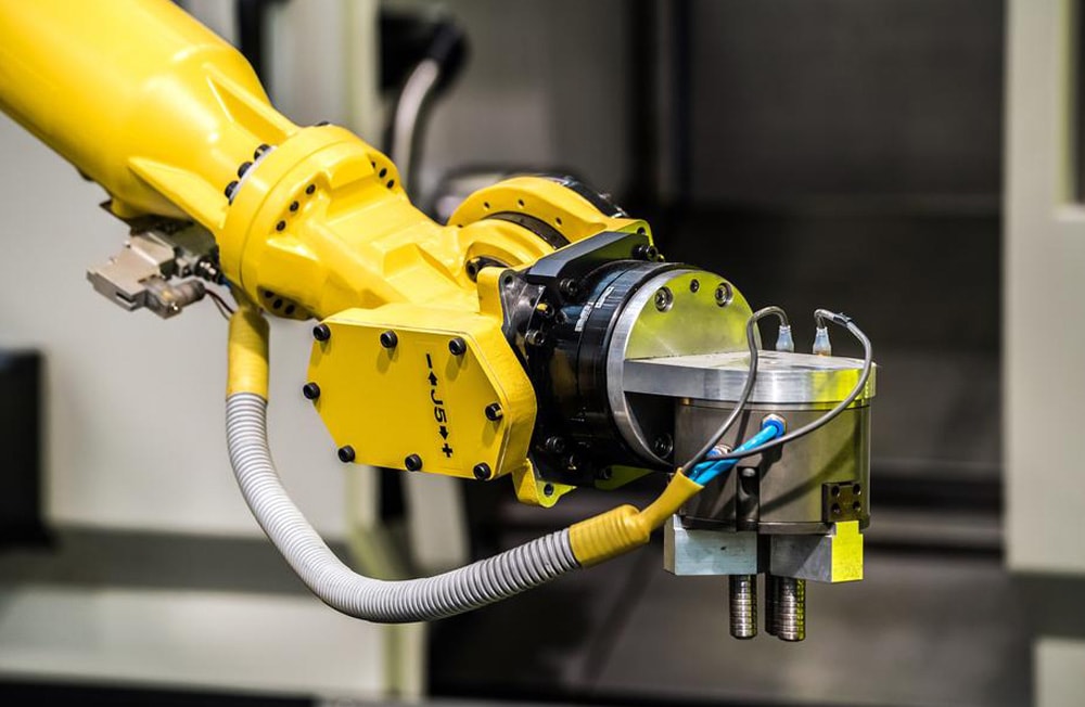 White industrial robotic arm precision automation
